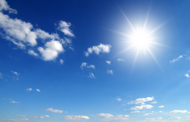 Obraz na płótnie Canvas sun on blue sky