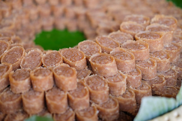 Dried rice balls made from rice and coconut.