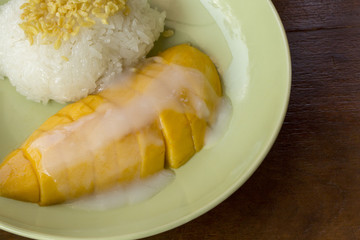 Mango with sticky rice and coconut milk,Thai style tropical dessert.
