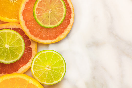  Grapefruit, lime, and orange slices with copyspace