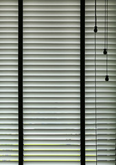 abstract curtain with jalousie with straight lines on dark background