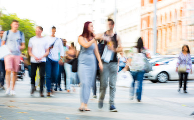  Blurred image of people walking in the Knightsbridge. Modern life concept
London, UK