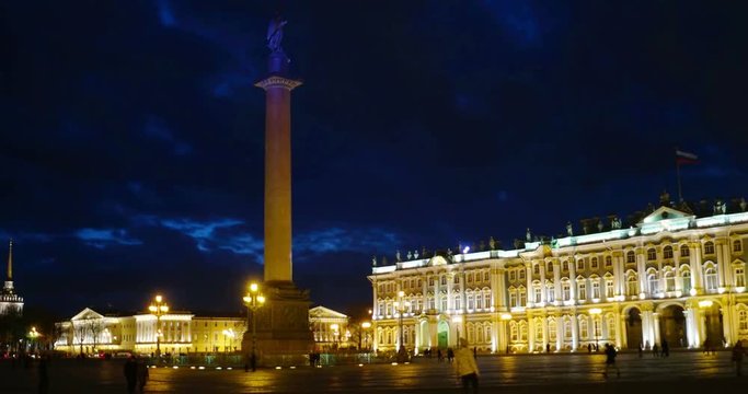 St Petersburg, Russia at night. Illuminated Winter Palace and Alexander Column at Palace square with dark sky in Saint Petersburg, Russia