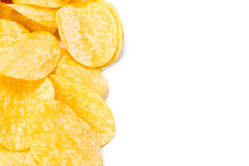 yellow potato chips isolated on white
