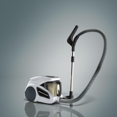 3d render of vacuum cleaner on grey background image