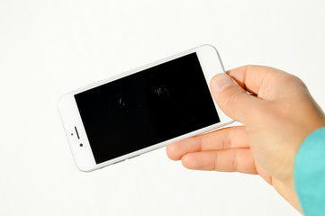 Lisbon Portugal - 20 March, 2017: Closeup on man hand holding Apple iPhone 6 or 7 mockup space on white background