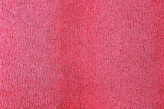 Surface of red plastic.