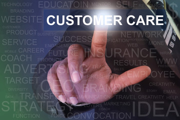 Businessman touching customer care button on virtual screen