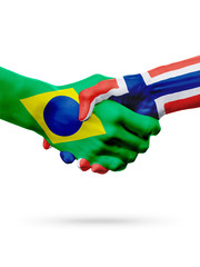 Flags Brazil, Norway countries, partnership friendship handshake concept.
