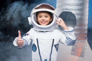 Girl in astronaut costume © LIGHTFIELD STUDIOS