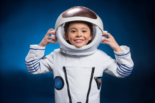 Little girl in space suit