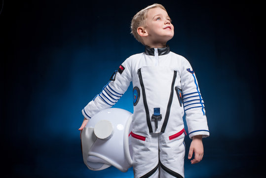 Little boy in space suit