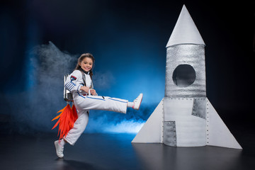 Girl in astronaut costume