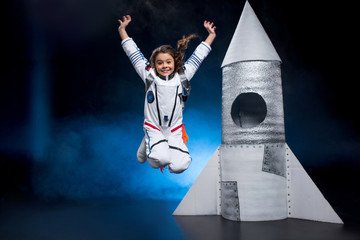 Girl in astronaut costume © LIGHTFIELD STUDIOS