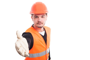 Attractive contractor doing a handshake gesture