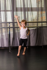 Little boy dancer in a dance studio