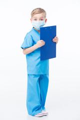 Boy playing doctor