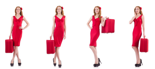 Young woman in red dress with suitcase isolated on white