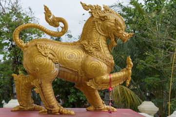 Gold Singha statue or lion statue