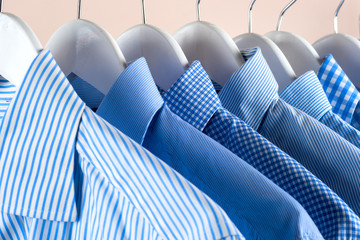 Cloth Hangers with Shirts. Men's clothes