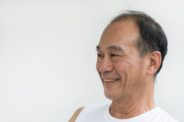 Obraz premium portrait of smile old man asia wear white shirt on white background