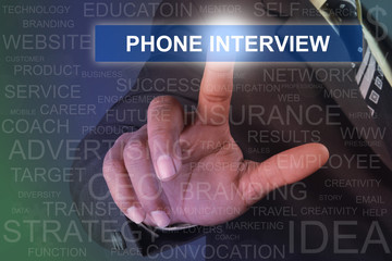 Businessman touching PHONE INTERVIEW button on virtual screen