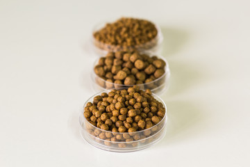 Fish feed isolated background