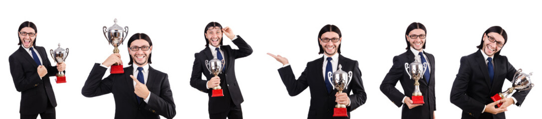 Businessman awarded with prize cup isolated on white