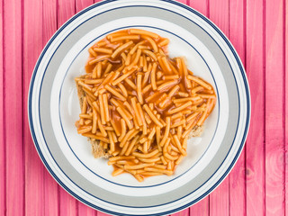 Spaghetti on Toasted Bread Served on a Plate