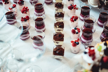 rows of italian mignon cakes on a white cloth