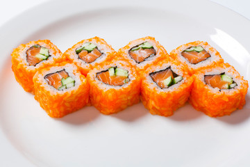 Rolls on the white plate. Japanese cuisine