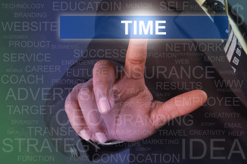 Businessman touching time button on virtual screen