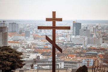 Bratislava, Slovakia - March 19, 2017: Orthodox cross symbol over a city