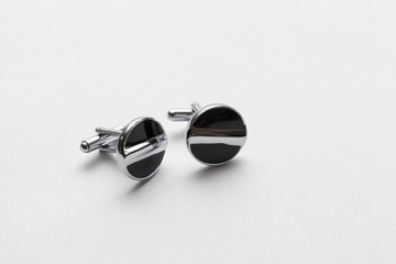 cufflinks on white background