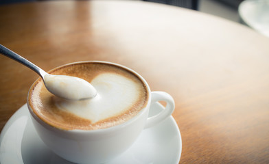 hot coffee with foam milk