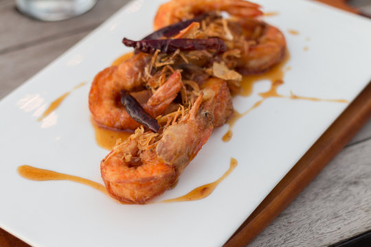 Deep fired shrimps serve with sweet fruit sauce