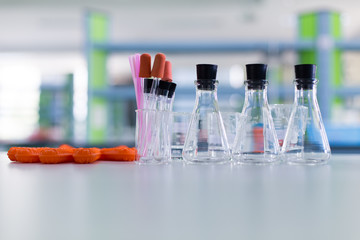 Beaker, flask, tube and glove for experiment chemical in Lab.