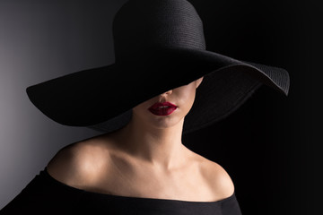 woman in black hat