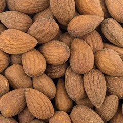Raw natural almonds close view.