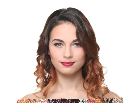 Young beautiful woman with modern hairstyle on white background