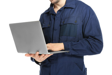Auto mechanic with laptop on white background, closeup
