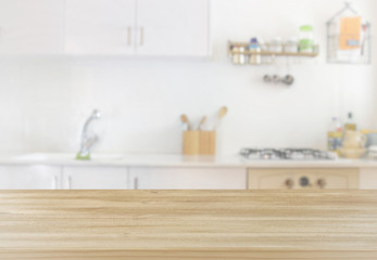 empty table and defocused modern kitchen background