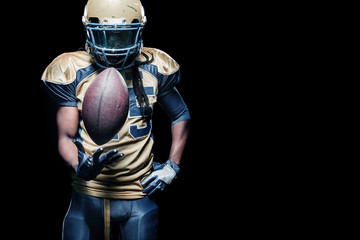American football sportsman player isolated on black background