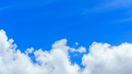 White clouds and blue sky background