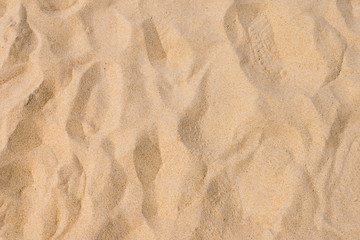 Fine beach sand in the summer sun