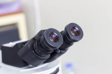 The microscope is in the lab.