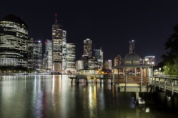 Fototapeta na wymiar Brisbane City nightcape and ferry terminal at Kangaroo Point