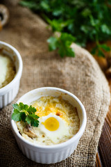 Baked egg with minced fish and mushrooms