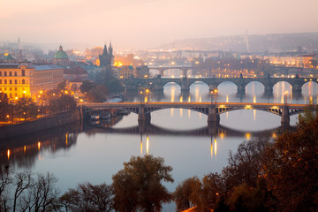Fototapeta na wymiar Morning view from above on Prague bridges, Charles Bridge on first plan.
