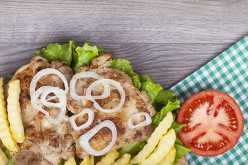 Meat grilled with salad